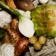 Maigre de la gironde en habit vert, échalotes,  têtes d’ail, oignons confits, écume de fortin